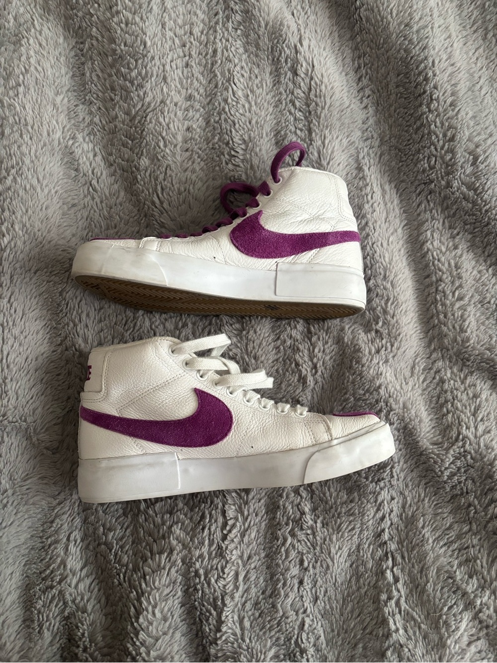Nike White High-Top Sneakers with Purple Swoosh